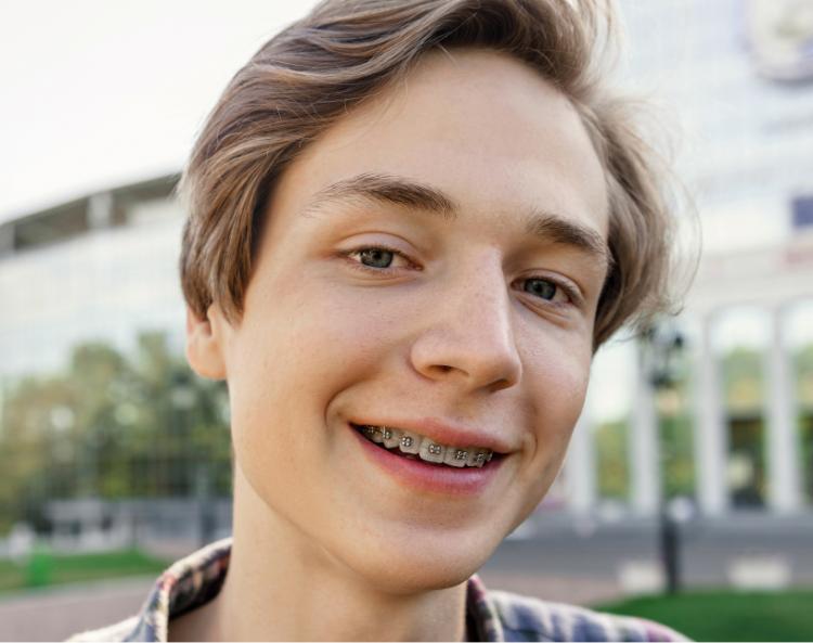 Smiling teenager with braces